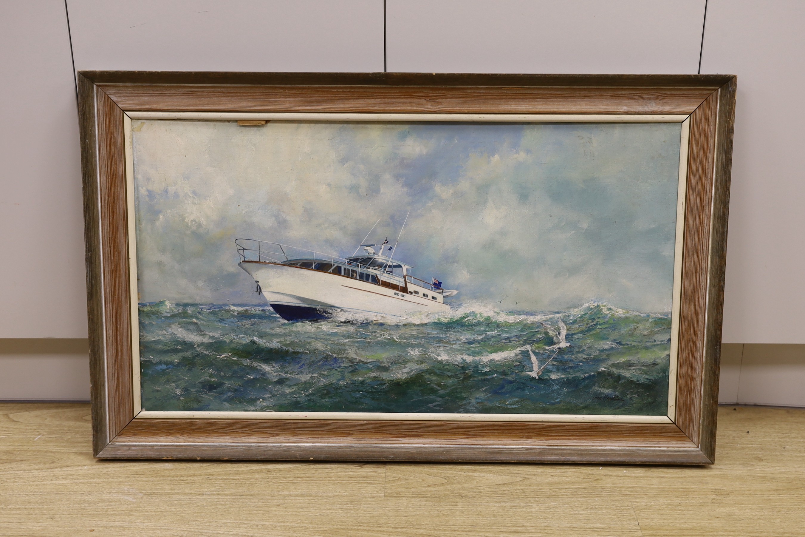 John Heseltine (1923-2016), oil on canvas board, Motorcruiser at sea, signed, 48 x 88cm